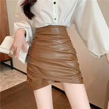 Sexy Women's Black Pleated Pencil Leather Skirt Party Clubwear Spring 2022 New Fashion High Waist Brown Mini Bottom