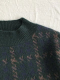 green knitted sweater with check