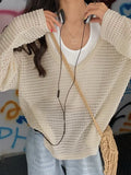 vintage cut out knitted sweater with loose fit and V