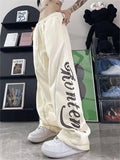 school baggy sweatpants with seams and logo