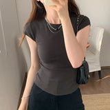 Black Round-Collar Short-Sleeved T-Shirt With A Black Round Neck Designed By European Designers Is A New Tight-Fitting, Skinny, Short-Style Blouse For Women In Spring And