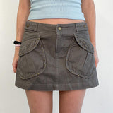 Zingj Hot Girl Rivet Small Pocket Low Waist Denim Skirt Spring / Summer 2023 New A-Line Skirt