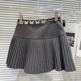 Solid Pleated Mini Skirt With Butterfly Chain- Outfit