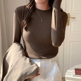 Women Wear A Long-Sleeved White T-Shirt With A Half-High Collar To Show A Thin Blouse In Autumn And