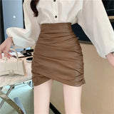Sexy Women's Black Pleated Pencil Leather Skirt Party Clubwear Spring 2022 New Fashion High Waist Brown Mini Bottom