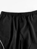 parachute trousers with cargo pockets and piping