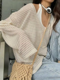 vintage cut out knitted sweater with loose fit and V