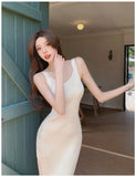 Zingj The Summer Of 2024, She Wore A Sling Vest Dress And A French-Style Fishtail Knitted Dress With