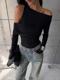Black Asymmetrical Cut Out Off Shoulder Long Sleeve Top- Outfit